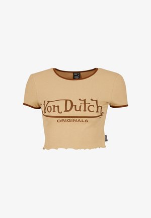 Rövid ujjú, crop fazonú póló világos bézs bordás anyagból. Barna hímezett márkalogóval és kontrasztos barna díszítéssel a nyakvonalon és az alján.