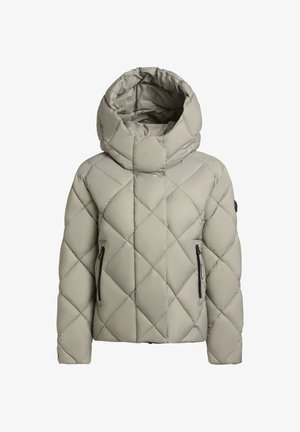 Keredatud puffjakker heledas beežis, millel on kõrge krae ja ülekaaluline kapuuts. Omab külgsi zip-taskuid ja tekstuuriga rombimustrit.