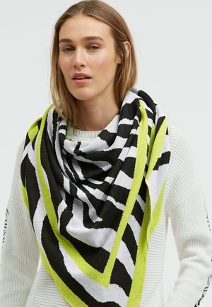 Großer Schal mit Zebra-Muster in Schwarz und Weiß, umrandet von leuchtendem Limettengrün. Hergestellt aus weichem, strukturiertem Stoff.