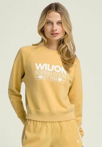 Wilson Felpa - golden