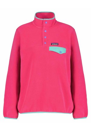 Jasnoróżowy polarowy pulower z turkusowym wykończeniem, zatrzaskami oraz turkusową klapką kieszeni na piersi z zatrzaskiem.