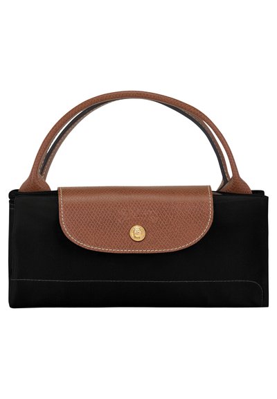 Schwarze Stofftasche mit einem strukturierten braunen Lederdeckel und glatten Griffen, ausgestattet mit goldenen Beschlägen und weißen Nähdetails.