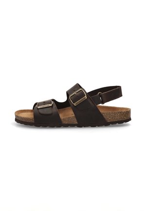 Sandalias marrones con dos hebillas ajustables, diseño de punta abierta y una plantilla de corcho. Suela de goma con agarre texturizado. Estilo casual.