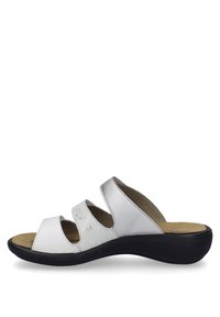 White and silver open-toe sandals with three wide straps, curved black outsole, and cushioned footbed, featuring a smooth leather texture.