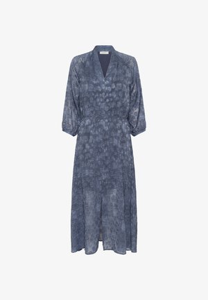 Zila paraugi kleita ar garajām piedurknēm, V veida kakla izgriezumu un šķērēm. Izgatavota no viegla auduma ar smalku tekstūru.