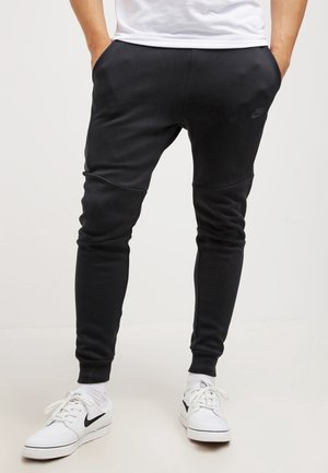 Pantalones deportivos - black