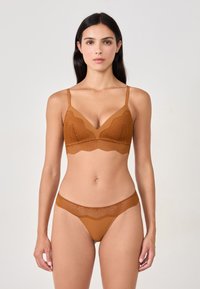 Brown lace lingerie set featuring a bralette with a V-neck and scalloped edges, complemented by matching high-waisted panties.