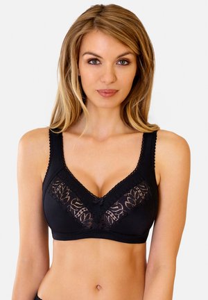 Black bra with lace detailing at the front, soft texture, wide straps, scalloped edges, and a small decorative bow at the center.