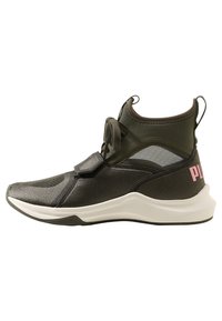 Black athletic sneaker with a stretchy upper, mesh side panels, and a pink logo on the heel. Features a cushioned white sole.