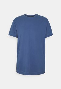 Blauw T-shirt met korte mouwen, gemaakt van katoen, met een ronde hals, rechte zoom en subtiele stiksels op de mouwen en zoom.