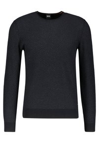 Mörkblå stickad tröja med rund halsringning, långa ärmar, strukturerat mönster samt ribbade mudd och fåll. Varumärkesetikett synlig.