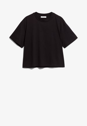 T-shirt in cotone nero con scollatura rotonda e maniche corte. Caratterizzato da una vestibilità ampia e un design semplice e privo di ornamentazioni.