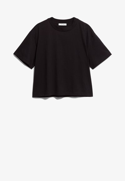 T-shirt de algodão preto com decote redondo e mangas curtas. Apresenta um corte descontraído e um design simples, sem adornos.