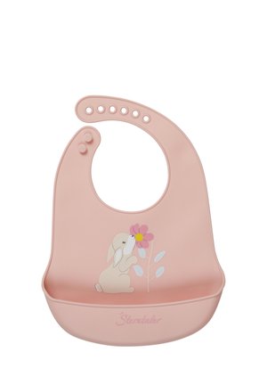 Soft pink silicone baby bib with adjustable snap closures, front pocket, and illustration of a bunny smelling a pink flower.