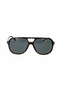 Occhiali da sole aviatore tartarugati con lenti scure. Montatura in plastica con un caratteristico design a doppio ponte e accenti in metallo sulle aste.