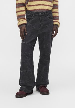 FAVELA, CUTOUT WAVE - Дънки с широк крачол - black denim