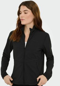 Giacca sportiva nera con collo alto, zip frontale e tasche laterali. Materiale leggero, design aderente e polsini elastici.