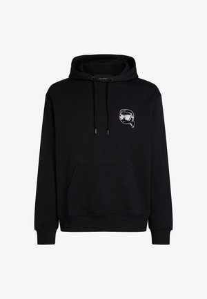 Schwarzer Hoodie aus Baumwollmix, mit Fronttasche, Kordelzugkapuze und besticktem Design auf der Brust mit Cartoon-Gesicht und Sonnenbrille.