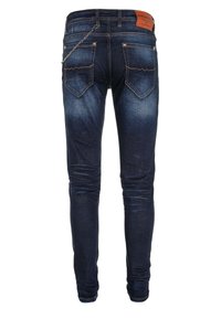 Dunkelblaue Skinny Jeans aus Denim, mit einer Kettendetail, zwei Gesäßtaschen mit dekorativem Stich und einem Lederschild an der Taille.