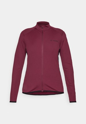 Burgundy long-sleeve jacket with full front zipper, high collar, black accents on shoulders, and subtle branding on the chest.