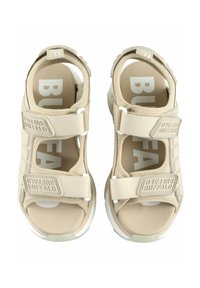 Sandales beiges avec des brides ajustables, semelles texturées et logo sur les brides. Design ouvert avec une semelle épaisse et une semelle intérieure rembourrée.