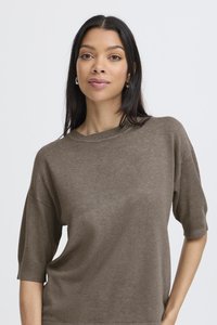 Brown knitted sweater with short sleeves, relaxed fit, and a scoop neckline. Minimalistic design with a soft texture against a white background.
