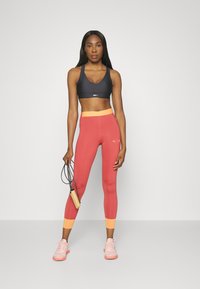 Puma FIRST MILE 7/8 - Tights - astro red
