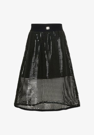 Jupe noire à sequins avec une taille ajustée, une silhouette évasée et un voile transparent à motif de pois. Texture lisse avec des accents réfléchissants.