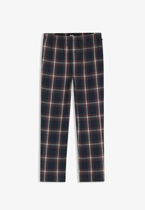 Granatowe spodnie w kratę z czerwonymi i białymi paskami, wyposażone w elastyczny pas i miękką, bawełnopodobną teksturę. Zaprojektowane dla komfortu i codziennego noszenia.