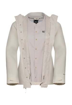 Giacca impermeabile beige chiaro con cappuccio, bottoni a pressione e fodera in rete. Caratterizzata da un logo sul lato sinistro del petto e polsini regolabili.