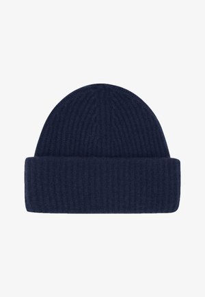 Marineblauwe gebreide beanie muts met ribbeltextuur en een omgeslagen randontwerp, gemaakt van zacht materiaal voor warmte.