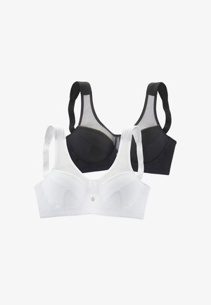 Zwei Bh's, einer schwarz und einer weiß, aus glattem Stoff, mit gepolsterten Cups, verstellbaren Trägern und dekorativen Nähten in Gold.