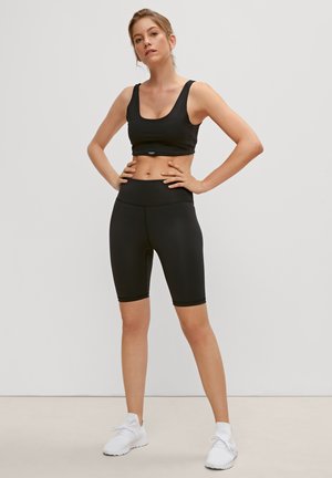 SKINNY HYPERSTRETCH - Shorts - black