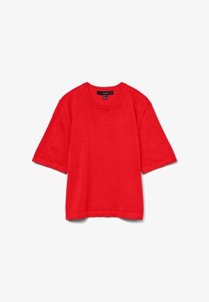 Pull en tricot rouge vif à manches courtes avec un col rond et une étiquette de vêtement noire au dos du col, posé à plat sur un fond blanc.