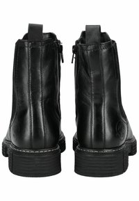 Botas de cuero negras hasta el tobillo con una textura suave, cremalleras laterales y una suela de goma resistente con un detalle de puntada blanca en contraste.