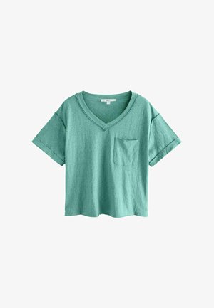 Majica kratkih rukava s V-izrezom u svijetlozelene boje, izrađena od mekanog materijala, s džepom na prsima i detaljem savijenih rukava.