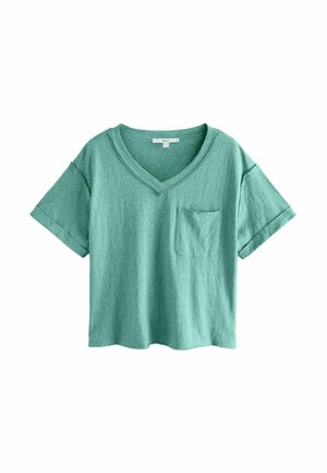T-shirt à manches courtes en V vert menthe fabriqué en matériau doux, avec une poche avant et des manches roulées, offrant une coupe décontractée.