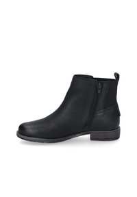 Botines negros de tobillo, hechos de material sintético suave, con cremallera lateral, tacón bajo y detalles elásticos para un ajuste ceñido.