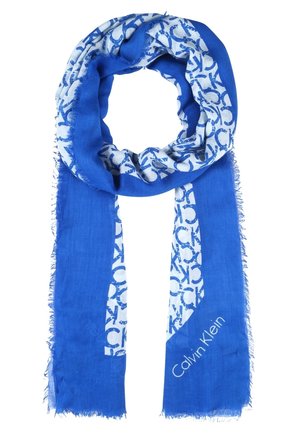Blue and white scarf with repeating "CK" pattern and "Calvin Klein" logo, edge frayed, loosely looped at top.