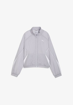 Veste de sport Puma gris clair avec fermeture éclair intégrale à l'avant, col montant, poignets élastiques et détails blancs sur les manches et les poches.