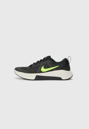 Black athletic shoes with a textured mesh upper, neon green Nike logo, white midsole, and a rubber outsole. Features a heel pull tab.