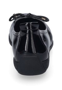 Černé lakované kožené mokasíny s kulatou špičkou, zdobené mašlí na vrchu a s texturovanou gumovou podešví pro lepší grip.