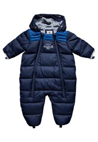 Marinblå puffy snickerdress med huva, med horisontella quiltade paneler, två dragkedjor och blå accentstickningar. Grå fleecefodrad insida.