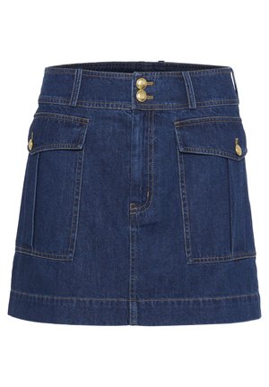 Jeanskjol i mörkblått med två framfickor, knäppningar i mässing och kontrasterande sömmar. Har en rak skärning och nederkant.