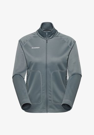 Veste polaire grise zippée à texture côtelée, col montant, poches latérales zippées, et logo "Mammut" sur la poitrine.