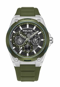 Reloj verde oliva con bisel de acero inoxidable, esfera negra texturizada, múltiples subesferas y correa de goma. Presenta marcadores de hora en blanco destacados.
