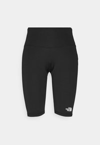 Černé cyklistické šortky z pružné látky, s vysokým pasem a malým bílým logem na levé noze. Hladký povrch, délka po kolena.