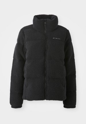 Black fleece jacket with full front zipper, high collar, and Columbia logo on the left chest.