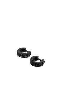 Pendientes de aro negros con un diseño circular y suave que presenta tres piedras preciosas negras incrustadas en un lado. Textura metálica con un acabado pulido.