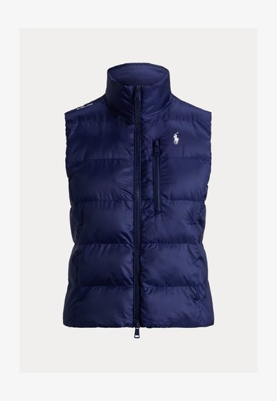 Μπλε ναυτικό αμάνικο γιλέκο με φερμουάρ μπροστά και φερμουάρ σε τσέπη στο στήθος, με μικρό λευκό κεντημένο λογότυπο παίκτη πόλο στο στήθος.